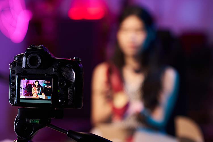 social media marketing professional shooting a video